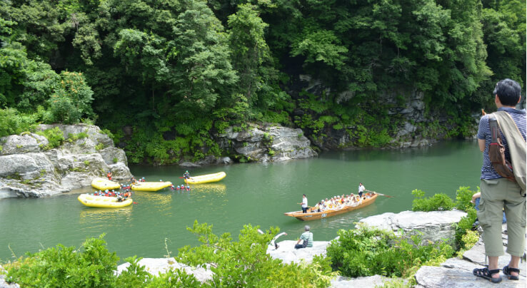 Watching others enjoy the river boating and whitewater rafting