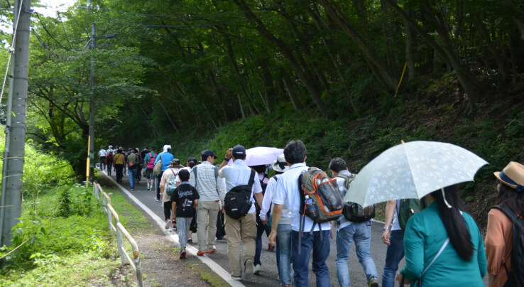 Climbing a steep hill to get to the ropeway station