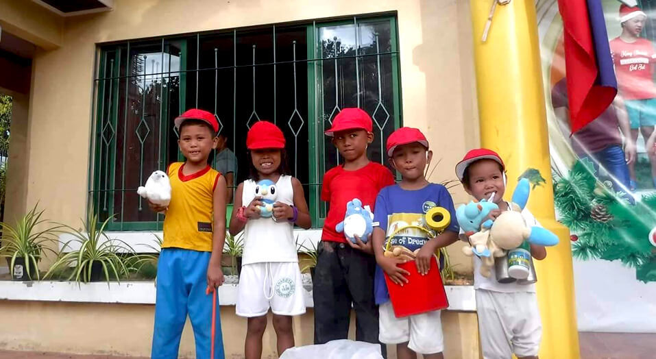 Children in the orphanage received the caps without any problems, and their photos were sent to JCS.